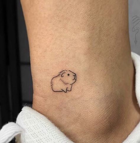 Funny Ankle Tattoo, Guniea Pig Tattoo Ideas, Hamster Paw Tattoo, Capybara Tattoo Small Simple, Guinea Pig Paw Print Tattoo, Guinea Pig Tattoo Ideas, Gerbil Tattoo, Wombat Tattoo, Guinea Pig Tattoo