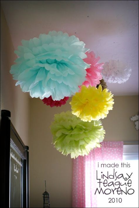 Tissue paper pom poms hanging from ceiling create a whimsical effect Classroom Hanging Decorations, Classroom Hanging Decorations Ceilings, Zebra Cookies, Diy Playroom, Tissue Pom Poms, Tissue Paper Pom Poms, Paper Pom Poms, Party Deco, Playroom Organization