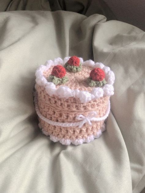 crochet , pink , strawberry , cake , coquette Kawaii Crochet Clothes, Coquette Crochet Ideas, Crochet Projects Aesthetic, Aesthetic Strawberry Cake, Pink Strawberry Cake, Cake With Bow, Pink Coquette Aesthetic, Coquette Crochet, Crochet Coquette