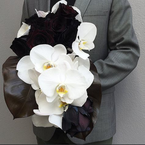 Black/White/Grey #bride #bridal #wedding #bridalbouquet #black #white #roses #phalaenopsis #blackroses White Black Bouquet, Black Crystal Bouquet, Black Daliah Bouquet, Black And White Cascade Bouquet, Black And White Orchid, Orchid Bouquet Wedding, Orchid Bouquet, Orchid Wedding, Black Orchid