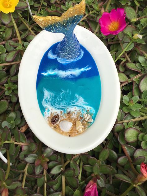 Porcelain trinket dish with resin mermaid tail. Mermaid Ring Holder, Resin Mermaid Tail, Funky Pots, Resin Mermaid, Beachy Stuff, Ocean Ring, Fav Products, Bathroom Stuff, Mermaid Ring