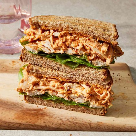 This rotisserie chicken sandwich is flavored with a dressing inspired by muhammara—a Middle Eastern sauce made from roasted red peppers, breadcrumbs, walnuts and spices. Sandwiches With Rotisserie Chicken, Rotisserie Chicken Sandwich, Chicken Sandwich Spread, Chicken Sandwich Recipe, Protein Lunch, Cook Dinner, Chicken Sandwich Recipes, Sandwich Spread, Meal Prep Bowls