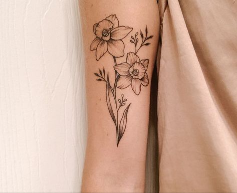 simple birth flower tattoo | Flower tattoo by  Skye Sales Daffodil And Ladybug Tattoo, Jonquil And Daffodil Flower Tattoo, Narcissa Flower Tattoo, Narcissus Holly Flower Tattoo, Naricuss Flower Tattoo, Paperwhites Tattoo, December Birthday Tattoo, Narcissus And Holly Flower Tattoo, Holly And Narcissus Tattoo