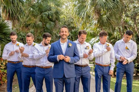 Tropical colorful boutonnieres with navy blue pants. Silk flowers for rent Cancun Riviera Maya and Tulum wedding Dreams Jade Cancun wedding Esteban Bahena Photography Blue Groomsmen Attire Casual, Blue And Tan Wedding Party, Groomsmen Outfits Casual, Groomsmen Attire Navy Blue, Blue Groomsmen Attire, Groomsmen Attire Navy, Las Vegas Wedding Inspiration, Navy Blue Groomsmen, Orange Lilly