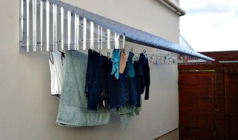 Understandably, everyone wonders about this. In wet and windy conditions you hang your clothes doubled over the line so that they are not hanging too low and allow a small space at the side and they will dry perfectly. Some more tips for best results. There are 4 lines in e Hanging Washing Outside, Covered Clothes Line Ideas, Garden Washing Line Ideas, Deck Clothesline Ideas, Outdoor Clothes Drying Ideas, Wet Clothes Hanging Ideas, Clothes Line Ideas Backyards, Washing Line Ideas Outdoor, Laundry Lines Outdoor