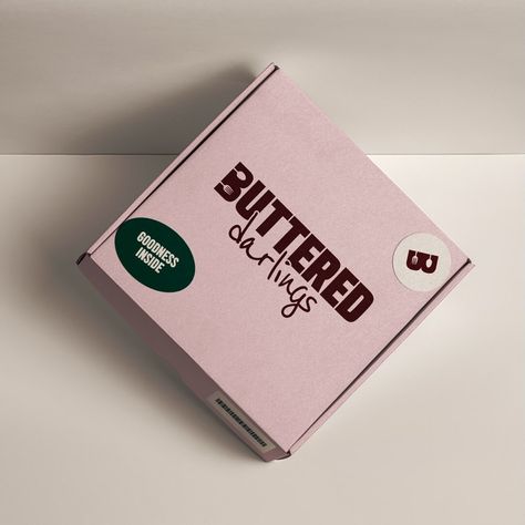 Introducing Buttered Darlings — your neighborhood go-to spot for cozy baked treats, where butter is the heart of baking 🥖 For the logo, we incorporated fun utensils element because we believe utensils are commonly associated with home-cooked meals and cozy dining experience, aligning perfectly with the brand’s vision. This element also captures the essence of the brand just by the first glance. We had so much fun creating this brand and definitely loved the outcome. Hit us up through our D... Butter Branding, Butter Brands, Bakery Branding, Bakery Packaging, Baked Treats, People Smile, Cookie Packaging, Chocolate Packaging, No Bake Treats