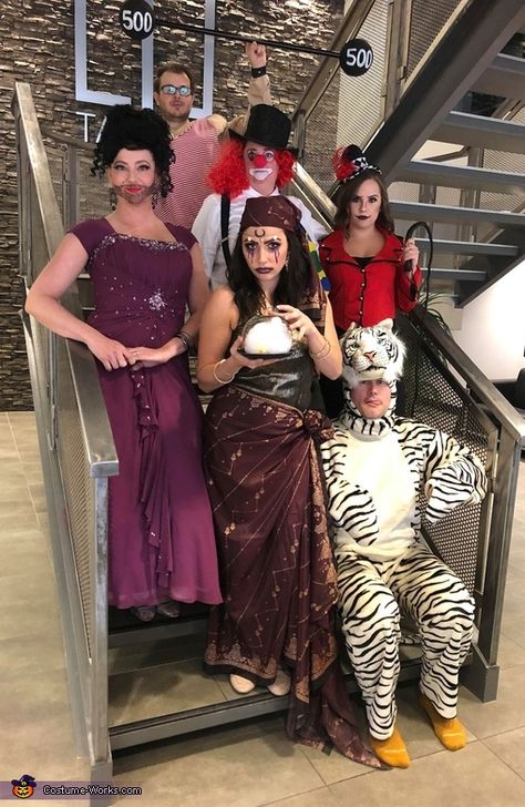 Miranda: The Production Team of Daytona Homes is dressed up as a 1930's circus including a ring leader, a white tiger, a bearded lady, a strong-man, a gypsy and a clown.... Circus Act Costumes, Creepy Lion Tamer Costume, Mens Circus Costume Ideas, Circus Monkey Costume, Women’s Circus Costumes, Halloween Carnival Costumes, Halloween Circus Theme Costume Ideas, Circus Theme Outfits Women, Circus Performer Outfit