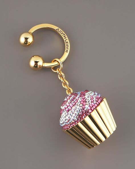 Judith Leiber Strawberry Cupcake keyfobThe only thing that might be better than eating a cupcake is accessorizing with one. Rose/clear crystals. Golden hardware. Ball closure. Logo on ring. Made in Austria of Italian materials. wonderful with light shelfwear no missing stonesnever usedgold tone  Comes in a dust bag. smoke free/pet free home  Model is holding a similar size keyfob for example Strawberry Cupcake, Judith Leiber Couture, Chain Keychain, Keychain Ring, Strawberry Cupcakes, One Rose, Judith Leiber, Designer Wallets, Small Handbags