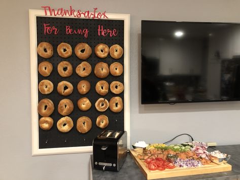 Thanks-A-Lox For Being Here Bagel Bar! Peg board spray painted black, dowels cut into pegs (painted silver), frame from ikea, lettering by Cricut. Add a charcuterie board of LOX, cream cheeses, radishes, cucumbers, dill, capers, red onions, etc. Yummy! Bagel Bar, A Charcuterie Board, Apartment Life, Red Onions, Radishes, Peg Board, Charcuterie Board, Silver Frame, Red Onion