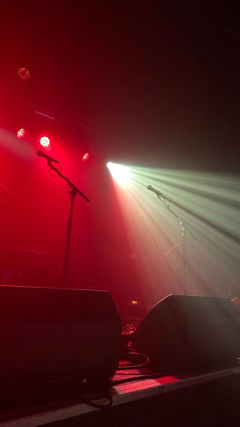 Spotlight on red flooded stage with two empty microphones ready for a perfromance. Stage aesthetic, concert :) Stage With Microphone, Concert From Stage, Stage Background Aesthetic, Concert Stage Aesthetic, Small Venue Concert, Red Concert Aesthetic, Stage Aesthetic Concert, On Stage Aesthetic, Rock Concert Aesthetic