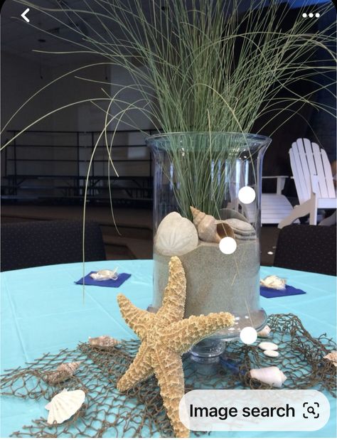 Starfish Centerpiece Ideas, Beach Retirement Party Decor, 60th Birthday Beach Theme, Under The Sea Decorations Centerpieces, Beach Theme Party Table Decor, Beach Theme Dinner Table, Outdoor Ocean Party Decorations, Coastal Dinner Party Table Settings, Beach Themed Centerpieces Diy