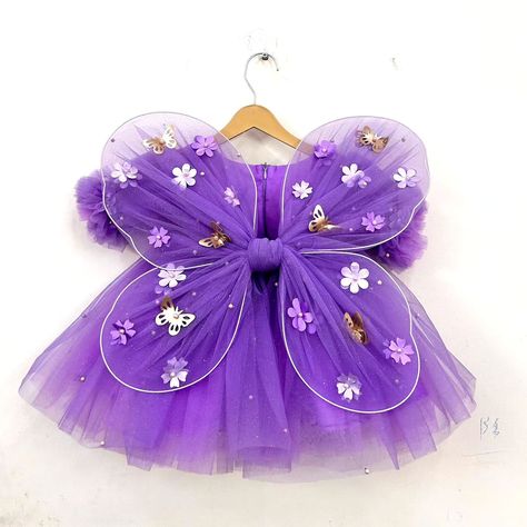 "Dress your daughter in our enchanting purple frock, adorned with delicate flowers, whimsical butterflies, a charming bow, and playful wings. Perfect for creating magical moments!" #Glam #highlights #kid #engaged #DesignerWear #hydrabad #reach #youtube #explore #mumbai #girls #InstaFashion (Girls dresses, Birthday frocks, Kids clothes, child's wear, mother daughter outfit, mommy and daughter outfits, party wear, hair accessories, girls shoes) #igreach #explore #feed #igtreands #engageandinspi... Butterfly Frocks For Kids, Mommy And Daughter Outfits, Purple Frock, Whimsical Butterflies, Birthday Frocks, Frocks For Kids, Mommy And Daughter, Dresses Birthday, Daughter Outfits