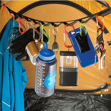 This gear line that will organize all your essentials at night. | 42 Insanely Clever Products You Need For Your Next Camping Trip Tent Hacks, Bil Camping, Zelt Camping, Kombi Motorhome, Auto Camping, Camping Diy, Camping Aesthetic, Camping Checklist, Camping Glamping