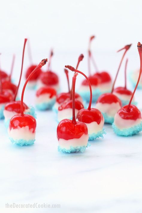 VODKA filled BOOZY CHERRY BOMBS in red, white, and blue for the 4th of July. Dipped in white chocolate and blue sprinkles. Fourth Of July Cherries, 4th Of July Cherries, Rummy Bears, Alcohol Treats, Midsummer Eve, Patriotic Food, Patriotic Desserts, Bombe Recipe, Boozy Desserts