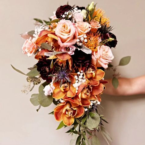 Autumn cascading bridal bouquet featuring rust cymbidium orchids | Instagram Orchid Bouquet Wedding, Cascading Bridal Bouquets, Orange Orchid, Orchid Bouquet, Orchid Wedding, Cymbidium Orchids, Bridal Bouquet, Florist, Orchids