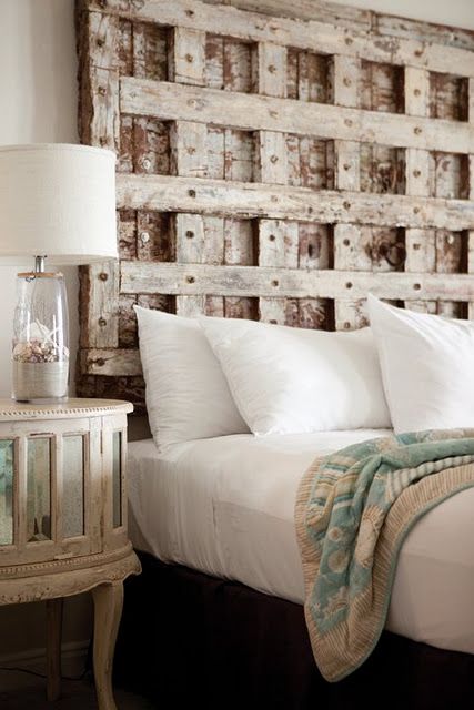 I want to try!!!! I'll bet you could do this yourself with pallets or reclaimed wood.  Wonder what the iron screw eye is used for (in the middle of the headboard)??? Headboards Beds, Kitchens Traditional, Headboard From Old Door, Bohemian Bedrooms, Creative Headboard, Kitchens Modern, Door Headboard, Traditional Kitchens, Bedroom Traditional