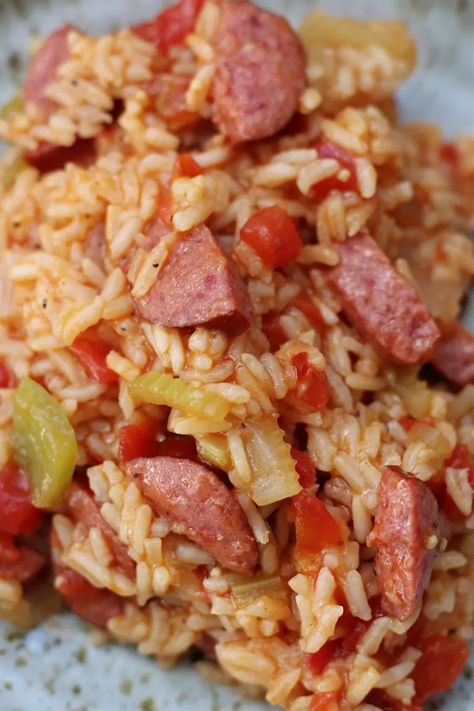 A Cowboy's Jambalaya (Instant Pot)--a colorful rice dish with beef smoked sausage, celery, green pepper, tomatoes and garlic. You're going to love how flavorful and how easy this dinner is to make. Jambalaya Instant Pot, Beef Smoked Sausage, Cajun Rice, Smoked Sausage Recipes, Celery Green, Rice Dish, Hearty Stews, Green Pepper, Instant Pot Dinner Recipes