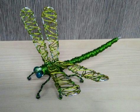 Green standing dragonfly wire sculpture.  Made from 22 and 24 gauge wires. Wire Sculpture, Macrame Plant, Macrame Plant Hanger, Plant Hanger, Sculpture, Green, Plants, Animals