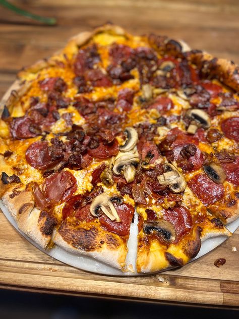 Canadian pizza made with prosciutto pepperoni bacon and mushrooms made all on a pizza stone. I will never eat take out pizza again ! Canadian Pizza, Mushroom Pizza Recipes, Pepperoni Chicken, Bacon Pizza, Lions Den, Stone Oven, Mushroom Pizza, Bacon Stuffed Mushrooms, Pizza Recipes Homemade