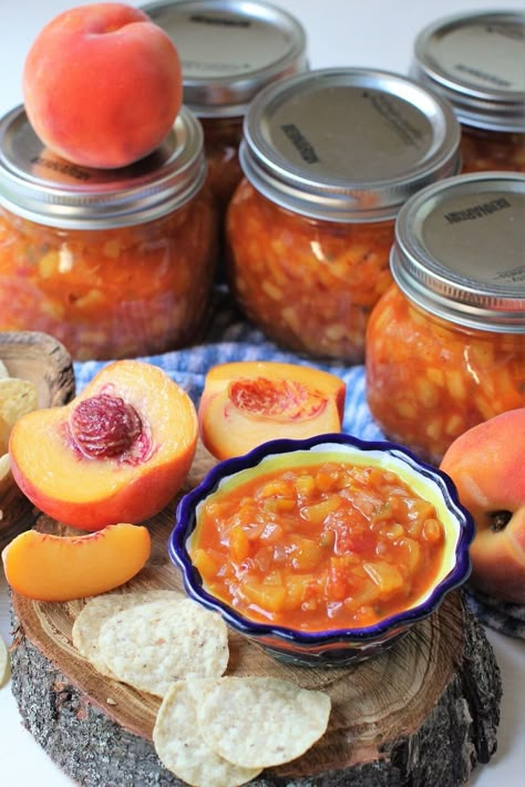 Peach Salsa has it all - sweet and tangy fruitiness with a spicy, fiery kick. Set your tastebuds dancing. Great for dipping, or on grilled meat or fish. Canning recipe has a special process to keep the peach texture intact without cooking to mush. Sweet And Spicy Salsa For Canning, Apricot Salsa Recipes Canning, Spicy Peach Salsa, Peach Salsa Recipes, Salsa Canning Recipes, Canning Peaches, Sweet N Spicy, Canning Recipe, Peach Salsa