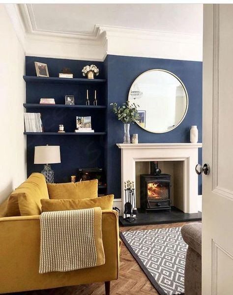 Living room with navy blue walls and white trim, ochre yellow sofa, mustard yellow decor, blue interiors Cool Living Room Ideas, Mustard Living Rooms, Vintage Living Room Design, Cool Living Room, Living Room Ideas With Fireplace, Living Room Colour Schemes, Fun Living Room, Dark Blue Living Room, Navy Living Rooms