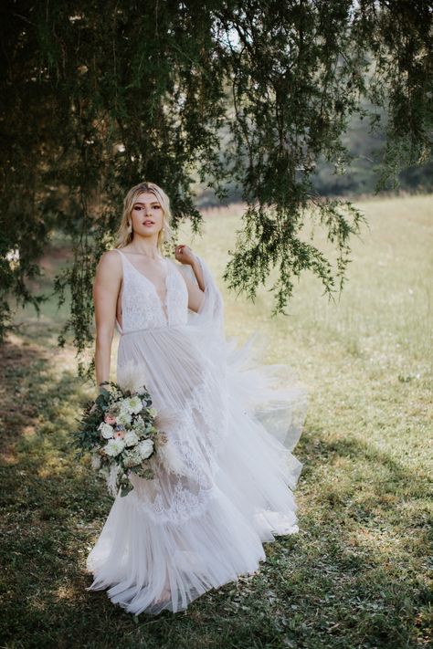 This bridal styled shoot was in Knoxville, Tennessee with a gorgeous layered dress from Lillian Ruth Bride by Willowby by Watters (in Clementine) and a cathedral veil. Photographer: Jayna Biery Photography  Model: Emily Lee  Wedding dress Lillian Ruth Bride Willowby by Watters Clementine  Florals by Echelon Florist  Planning: Summer Simmons Photo  Location: The Spangler House   Hair: Salon at Josie’s House Hair Salon, Willowby By Watters, Emily Lee, Bridal Styled Shoot, By Watters, Knoxville Wedding, Knoxville Tennessee, Tennessee Wedding, Cathedral Veil