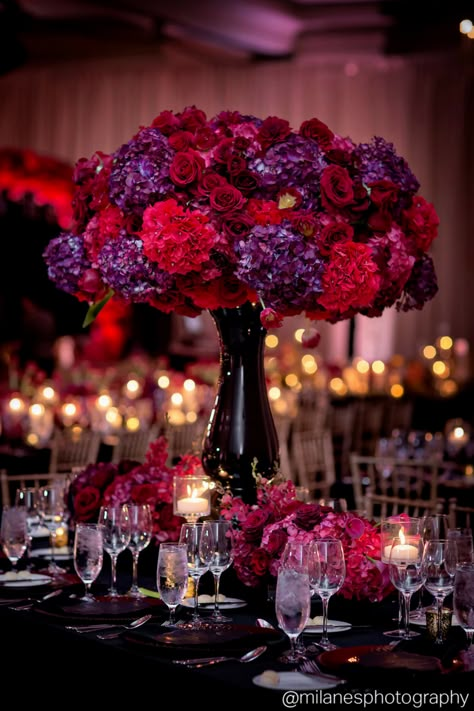 Bold + romantic wedding reception designed by Edge Design Group | Tall wedding centerpiece with red hydrangeas, red roses, and purple hydrangeas Purple And Red Table Setting, Red And Purple Decorations Party, Red White And Purple Wedding, Purple Red Gold Wedding, Red And Purple Floral Centerpieces, Purple And Red Decorations, Red And Purple Centerpieces, Purple Black And Red Wedding, Wedding Ideas Red And Purple