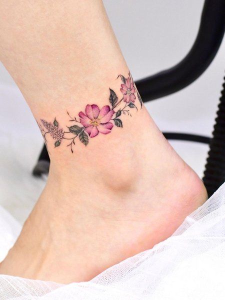 Floral Anklet Tattoos For Women, Wrap Around Ankle Tattoos, Anklet Tattoos For Women, Wrist Bracelet Tattoo, Floral Thigh Tattoos, Ankle Bracelet Tattoo, Bracelet Tattoo, Ankle Tattoos For Women, Flower Wrist Tattoos