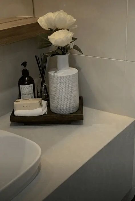 27 Lovely Bathroom Tray Decor Ideas For Your Home - Drop By My Home Bathroom Decor Tray Display, Trays For Bathroom Counter, Bath Tray Styling, How To Style A Bathroom Tray, Bathroom Display Ideas, Bathroom Vanity Tray Ideas, Bathroom Tray Decor Ideas, Small Powder Bathroom Ideas, Bathroom Tray Decor