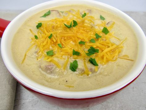 Smoked Sausage and Cauliflower Cheddar Soup Need a quick and easy soup to warm you up?  This soup is super hearty and has great flavor from the smoked sausage.  Cheese and heavy cream make it rich and creamy! #ketorecipes #keto #lowcarb #ketodiet #ketogenicdiet #lowcarbdiet #ketogenic #lowcarbhighfat #lowcarbrecipes #lchf #glutenfree #ketoweightloss #ketocookingchristian Sausage And Cauliflower, Cauliflower Cheddar Soup, Cauliflower Cheddar, Macro Recipes, Keto Soups, Recipe For 2, Quick And Easy Soup, Keto Dinners, Keto Soup