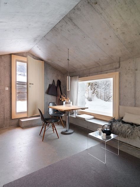 Concrete Cottage in the Swiss Alps - Archiscene - Your Daily Architecture & Design Update Concrete Cabin, Mountain Interiors, Concrete Interiors, Concrete Architecture, Concrete Home, Open Fireplace, Concrete House, Stil Inspiration, House Inspo