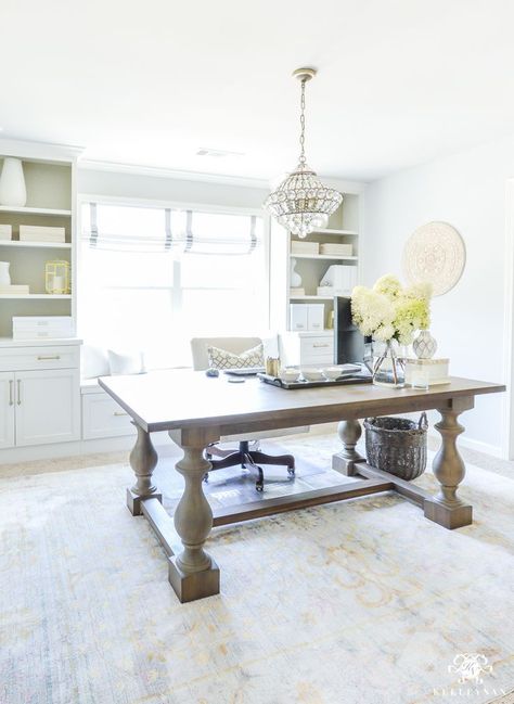 Using a dining room table as an office desk in your home office. Loving the mini chandelier, neutral decor, and shelving in my office. #office #officedecor #officedecoration #desk Hide Computer Cords, Home Office With Built Ins, Office Designs, Farmhouse Dining Table, Dining Room Office, Home Office Space, Office Room, A Desk, Farmhouse Dining