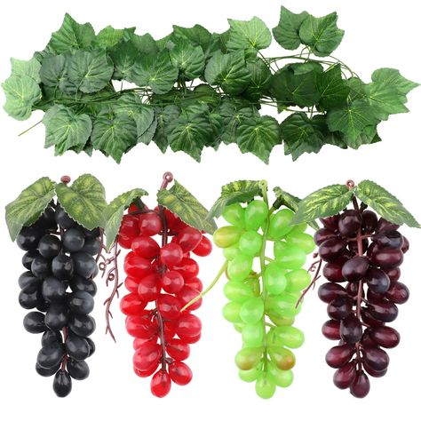 PRICES MAY VARY. Package Included: 4 string artificial grapes(4 colors: black, red, green, purple), 3 strands artificial grape vines. Material: Fake grape are made of rubber, artificial grape vine is made of plastic, environmentally friendly fabric, poisonless and harmless. Artificial Grape Details: Each string contains 36 pieces grapes, grape string size：7.1 inch / 18 cm, single grape size: diameter 0.67 inch / 1.7 cm, long 0.9 inch / 2.4 cm. Artificial grape vine details: Each strand is approx Vine Decor, Vegetable Pictures, Bunch Of Grapes, Wine Kitchen, Fake Fruit, Artificial Fruit, Wine Decor, Grape Bunch, Wine Wedding