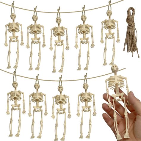 PRICES MAY VARY. MINI HALLOWEEN SKELETONS: Each figurine measures 5.9 inches, making them perfect for adding a spooky accent to your Halloween decorations. Their small size makes them ideal for placing in various locations around your home or yard. Despite their size, they add a noticeable eerie charm. FLEXIBLE AND REALISTIC: Halloween small skeletons can be used for desktop decorations, or string them together to create a skeleton wreath. That fit your Halloween theme. The flexibility adds an e Skeleton Theme Party, Halloween Graveyard Decorations, Graveyard Party, Full Body Skeleton, Body Skeleton, Skeleton Theme, Skeleton Wreath, Halloween Graveyard, House Yard