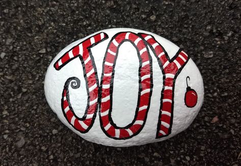 Joy, Candy Cane, Christmas painted Rock Joy Rock Painting, Christmas Stones, Skipping Rocks, Christmas Pebble Art, Christmas Rocks, Christmas Craft Show, Funny Rock, Diy Rock Art, Rock Hunting