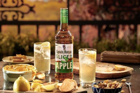 Captain Morgan Is Selling Sliced Apple Spiced Rum And It's About To Become Your Go-To Fall SpiritDelish Apple Captain Morgan Drinks, Captain Morgan Apple Drinks, Captain Morgan Spiced Apple Drinks, Captain Morgan Drinks, Green Apple Recipes, Apple Drinks, Flavored Rum, Apple Cocktail, Adult Beverages Recipes