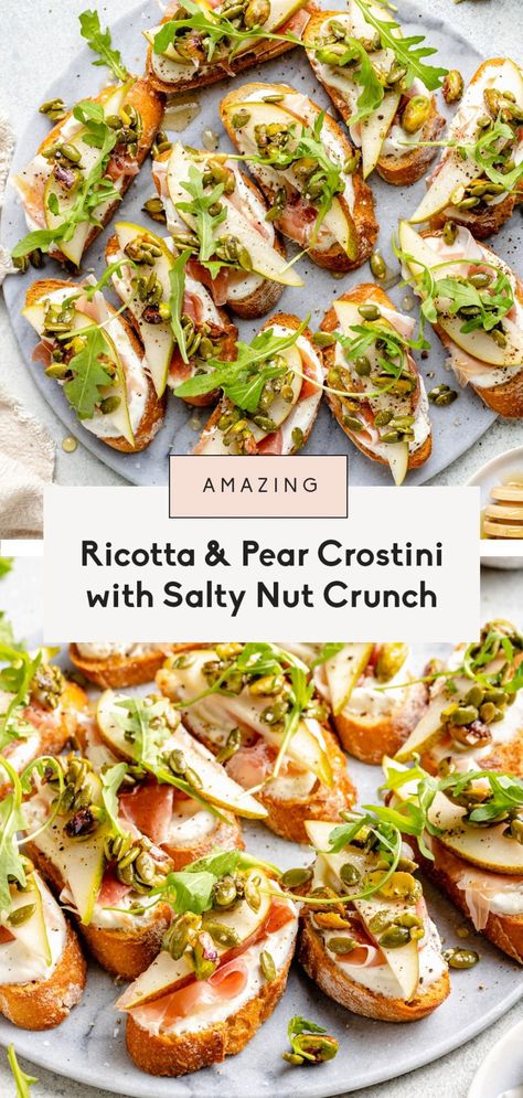 Gorgeous ricotta and pear crostini with savory prosciutto, fresh arugula and a salty pumpkin seed pistachio crunch mixture. This easy appetizer is the perfect mix of sweet, savory, creamy and crunchy and is guaranteed to impress guests! Top with honey and a sprinkle of sea salt for the ultimate flavor combo. #appetizer #christmas #holidayappetizer #crostini #snack Savory Pear Recipes, Pear Crostini, Prosciutto Appetizer, Appetizer Christmas, Ricotta Crostini, Fall Appetizers, Raw Pumpkin Seeds, Pear Recipes, Pumpkin Seed