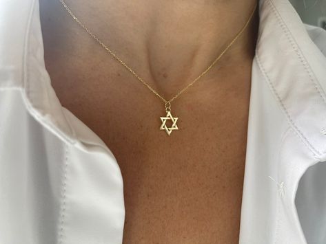 Star of David Necklace / 14k Gold Star of David Necklace / Small Star of David Pendant  this listing is for one star of David this is available with or without a chain. Please choose accordingly at check out. SOLID 14K YELLOW GOLD STAR OF DAVID NECKLACE . THE STAR AND CHAIN IS SOLID 14K YELLOW GOLD.  FREE SHIPPINGWITHIN THE USA METAL: 14k solid gold 585  STYLE: STAR OF DAVID NECKLACE PURITY: 14K SIZE: 11.5 mm AS IT IS WITH THIS ITEM ALL MY PIECES ARE HAND MADE. AND I STAND BEHIND EVERY PIECE. SA Star Of David Bracelet, Star Of, David Star, Star Of David Necklace, Star David, Bezel Necklace, Star Of David Pendant, Style Star, Diamond Solitaire Necklace