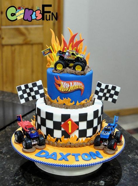 Monster car cake for a first birthday. Cars are non edible toys. Hotwheels Party Centerpieces, Hot Wheels Cake Birthdays, Hotwheels Monster Truck Birthday Cake, Monster Truck 2nd Birthday Cake, Hot Wheels Birthday Party Cake, Hot Wheels Theme Party, Hot Wheels Monster Truck Birthday Cake, Hot Wheel Cake Ideas, 5th Birthday Cake Ideas For Boys