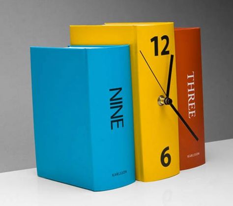 This stack of colorful books function as a clock.   They would be a perfect disguise on any bookshelf.