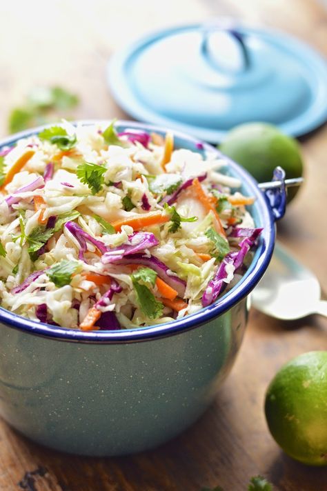 This Mexican cole slaw is lightened up with fresh lime juice and cilantro and takes about 5 minutes to make. Taco Coleslaw, Mexican Cole Slaw, Mexican Coleslaw Recipe, Mexican Coleslaw, Mexican Slaw, Coleslaw Recipes, Vegetarian Soups, Vegan Salads, Delicious Sweets