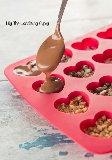 I had SO much fun creating these heart chocolates. I made them in several varieties, and I am going to tell you how each one turned out! I ... Chocolate Molds Recipe, Chocolate Hearts Candy, Chocolate Candy Recipes, Gourmet Candy, Valentine Desserts, Chocolate Candy Molds, Candy Hearts, Chocolate Hearts, Homemade Candies