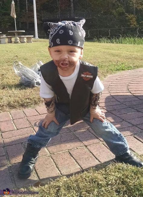 My 2 year old son Lucas is wearing a Harley vest and tattoo sleeved arms. a simple bandana and beard made from brown eyeshadow made it look authentic. He is also wearing his favorite motorcycle boots to complete the outfit. I got the idea because... Rider Outfit, Biker Costume, Motorcycle Man, Harley Men, Hot Halloween, Costume Works, Motorcycle Men, Motor Cycles, Classic Motorcycle