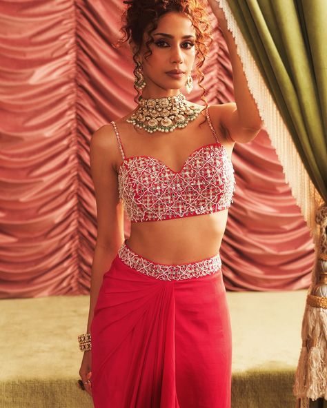 Step into the grandeur of Indian weddings with Seema Thukral’s latest collection, Haseena Dilruba. This collection is an ode to the rich heritage and vibrant traditions of India, beautifully infused into modern silhouettes. Whether you are the bride or a wedding guest, expect to be mesmerised by the timeless elegance and contemporary glamour in sarees, lehengas and more.. Find it on Fabilicious ✨ WhatsApp us on +91 99992 89222 for any queries 🌟Made to Measure 🌟Personal service with VC fo... Cape Set, Pink Cape, Rani Pink, Vacuum Storage, Indian Wedding Wear, Western Look, Draped Skirt, Embellished Blouse, Sleeves Blouse