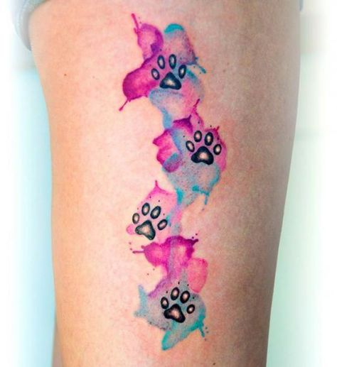 A nice colorful watercolor cat paw prints tattoo suitable for women. Style: Watercolor. Color: Colorful. Tags: Nice Cat Paw Print Tattoo, Pawprint Tattoo, Dog Paw Tattoo, Tattoo Dog, Kunst Tattoos, Paw Tattoo, Watercolor Tattoos, Disney Tattoo, Memorial Tattoos