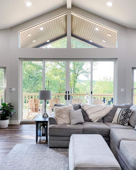 Light Grey Painted Walls, Farmhouse Baseboards, Cathedral Ceiling Living Room, Vaulted Ceiling Ideas, Grey Painted Walls, Vaulted Ceiling Living Room, White Shiplap Wall, Modern Farmhouse Living, Transom Windows