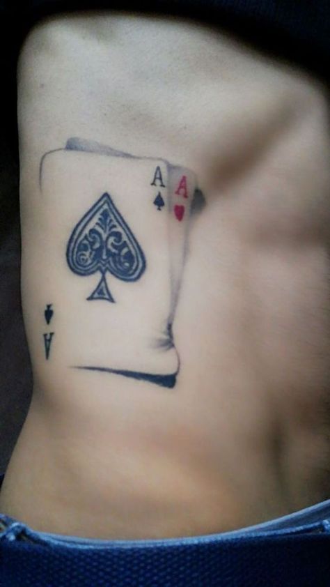 Deal yourself a winning hand: Card tattoo ideas. Explore designs that bring the luck and allure of the deck to life on your canvas. Two Aces Tattoo, Pair Of Aces Tattoo, Pocket Aces Tattoo, Ace Of Spades Tattoo Men, Ace Card Tattoo Design, Ace Tattoo Ideas, Card Tattoos For Men, Hudson Tattoo, Ace Of Hearts Tattoo