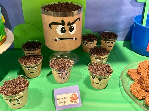 Mario Party Dessert Ideas, Goomba Pudding Cups, Mario Dessert Ideas, Super Mario Bros Dessert Table, Super Mario Desserts, Mario Dessert Table, Super Mario Themed Food, Mario Themed Snacks, Mario Food