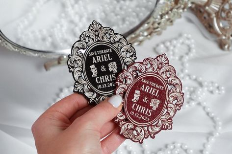 Save the dates magnets for Halloween wedding, Gothic-style skull frames with silver or gold lettering, burgundy and black wedding invitation Burgundy And Black Wedding, Save The Dates Magnets, Black Wedding Invitation, Halloween Weddings, Sweet Texts, Black Wedding Invitations, Dark Wedding, Moody Wedding, Rings Vintage