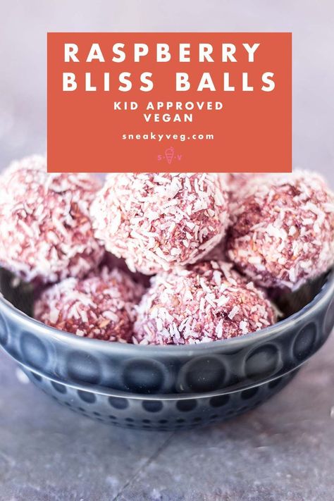 These beautifully pink raspberry bliss balls are really easy to make needing just five ingredients - raspberries, coconut, almonds, dates and oats. My kids love them and feel like they're getting a real treat. I'm happy too because I know they're full of healthy, natural ingredients. #blissballs #energyballs #vegansnack #vegantreat #raspberryblissballs Raspberry Bliss Balls, Coconut Almonds, Vegan Energy Balls, Raspberry Coconut, Raspberry Almond, Pink Raspberry, Raspberry Recipes, Vegan Kids, Bliss Balls